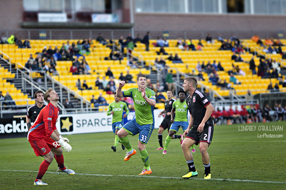Fast-paced soccer action captured courtside in Charleston, South Carolina.
