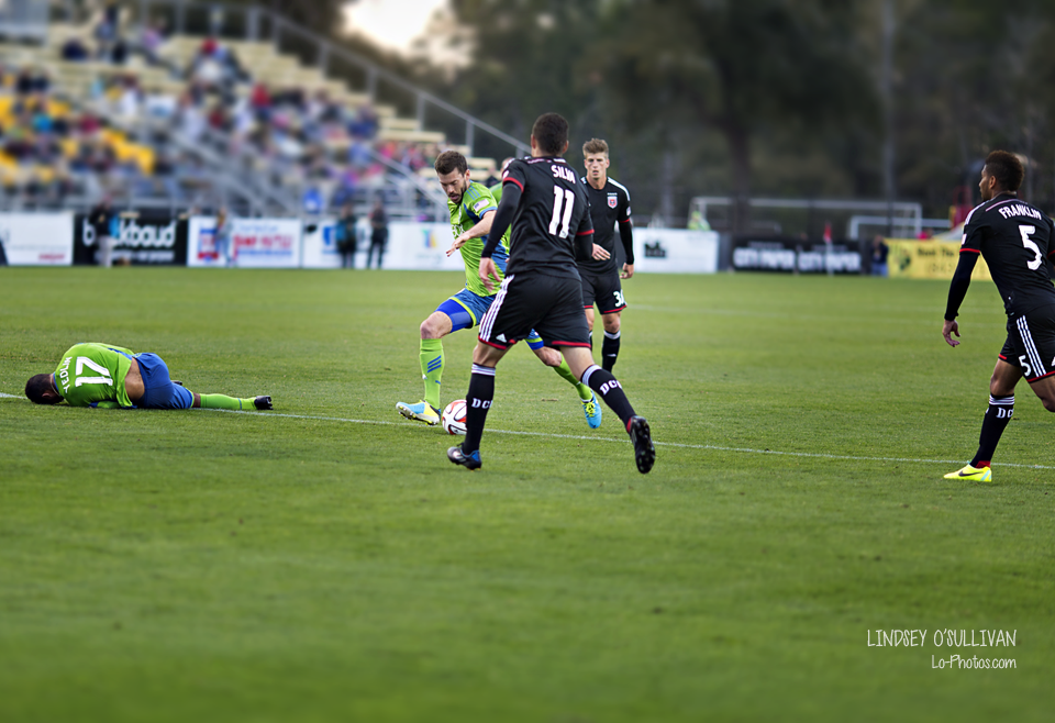 Seattle Sounders player in action during a match in Charleston, South Carolina.