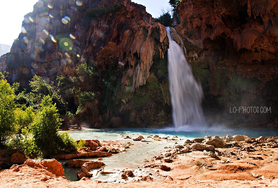 Mooney Falls dropping dramatically into a canyon pool in Havasupai