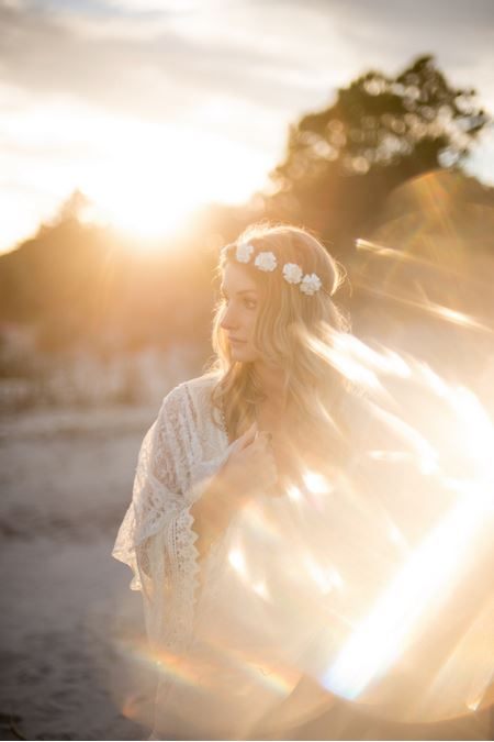 Coastal fashion photography featuring Free People dresses at the beach