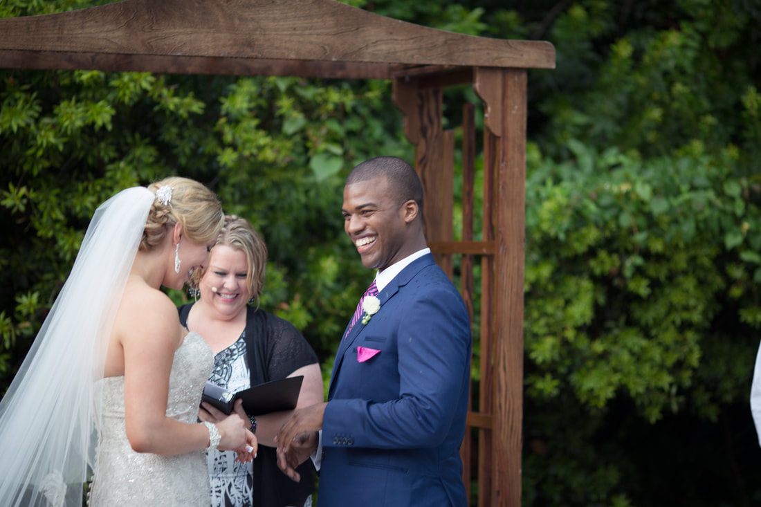 Candid reception photo from Sara and Dwayne's South Carolina wedding day.