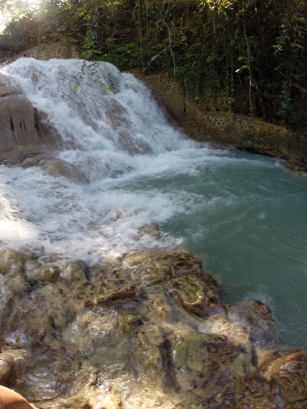 Water cascading over Dunn River Falls in Ocho Rios, Jamaica