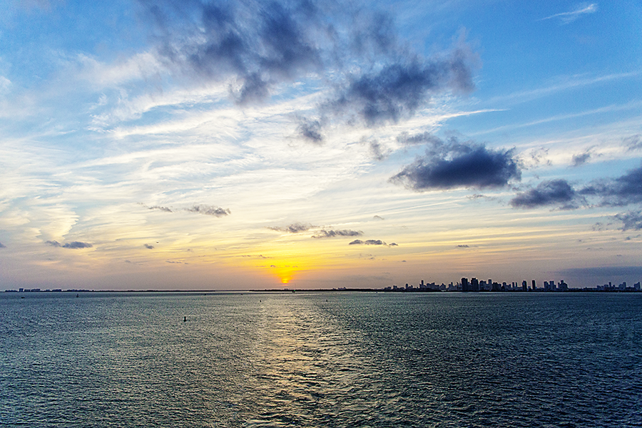 Boats in the port of Miami at sunset