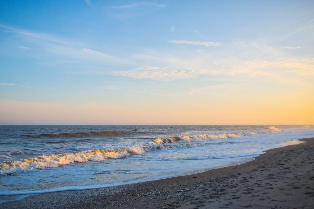Photo of sunset over the water in Edisto Island, South Carolina