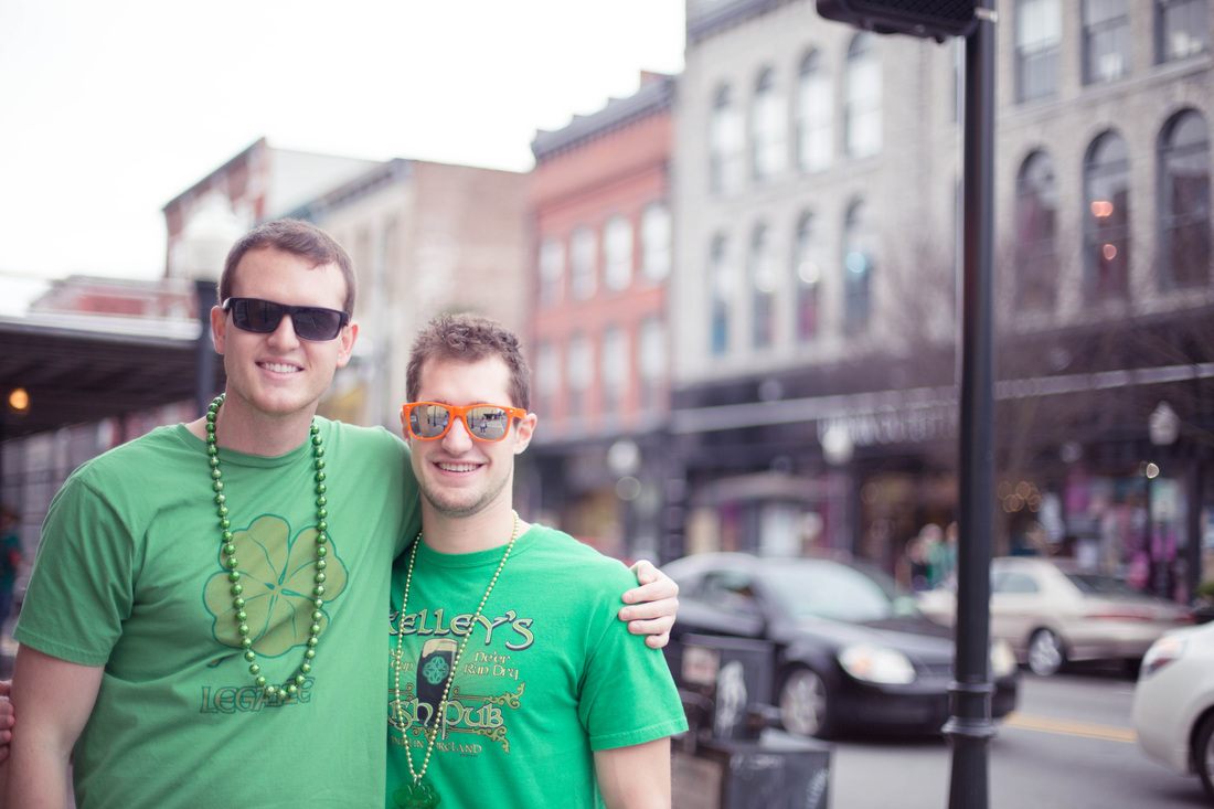 Friends enjoying the St. Patrick's Day festivities on the streets of Savannah
