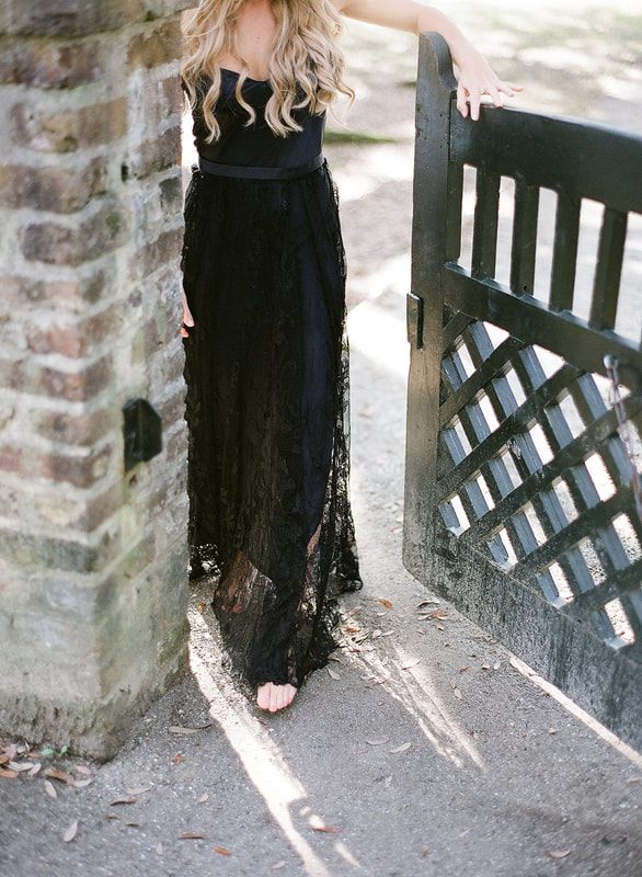 Garden bridal portrait at Middleton Place featuring a Shop Gossamer dress.