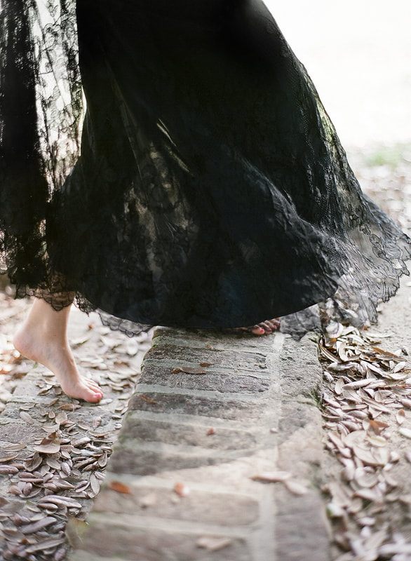 Elegant garden portrait featuring a Shop Gossamer bridal gown.