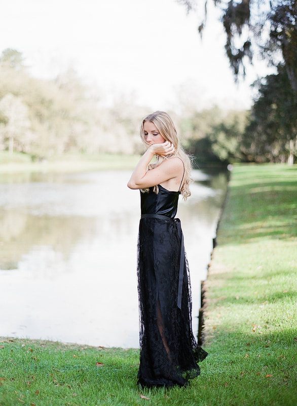 Garden bridal portrait at Middleton Place featuring a Shop Gossamer dress.