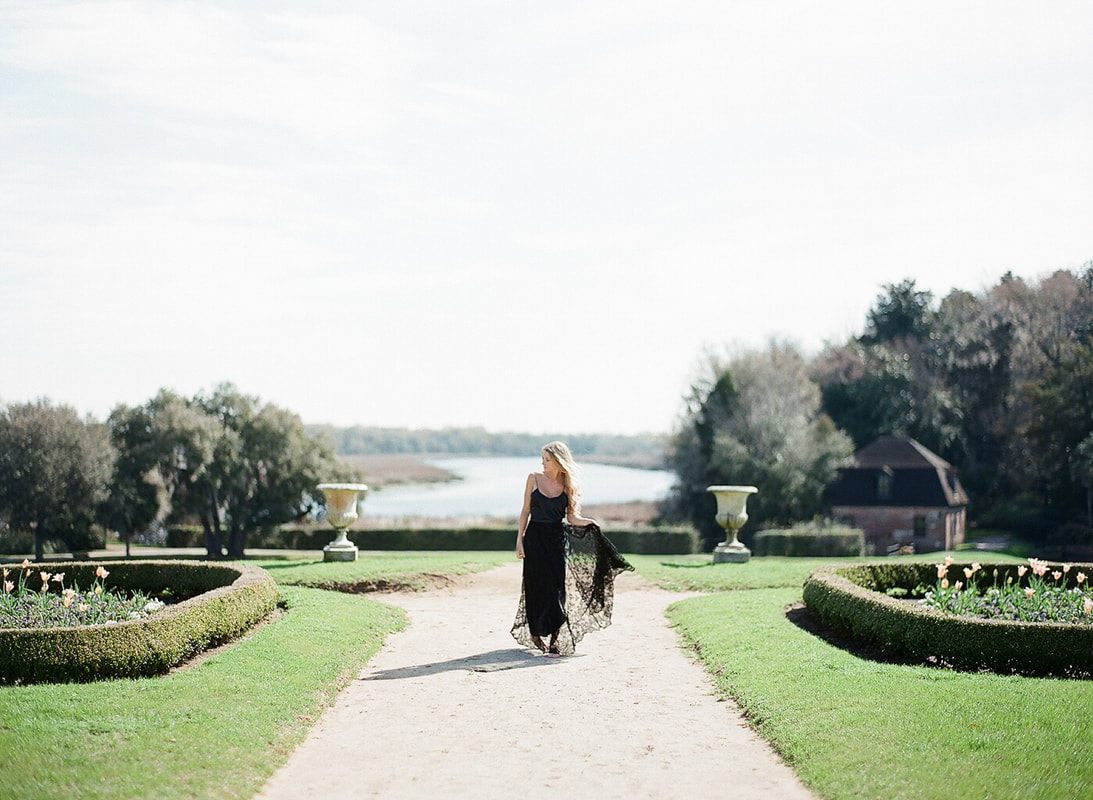 Elegant garden portrait featuring a Shop Gossamer bridal gown.