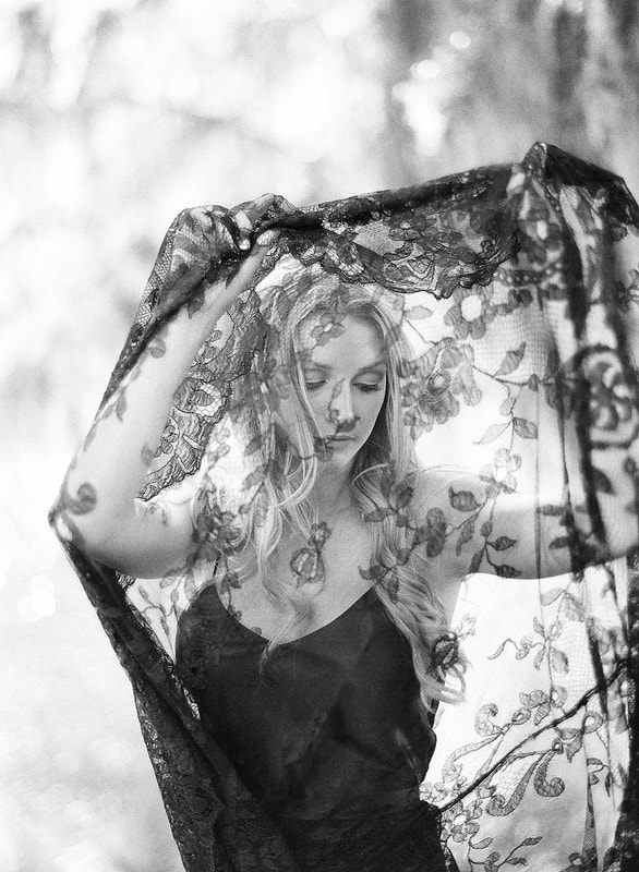Detail shot of a Shop Gossamer wedding gown at Middleton Place.