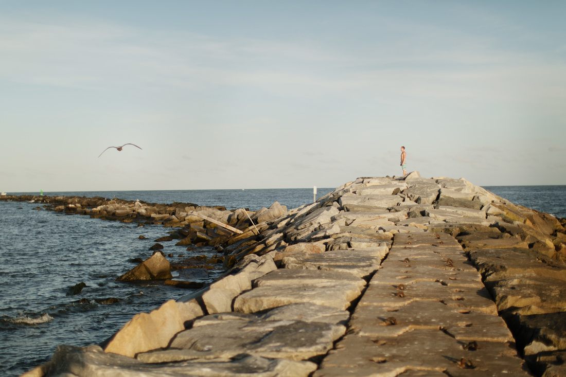 Sandy beach and ocean waves along the Ocean City, Maryland coastline
