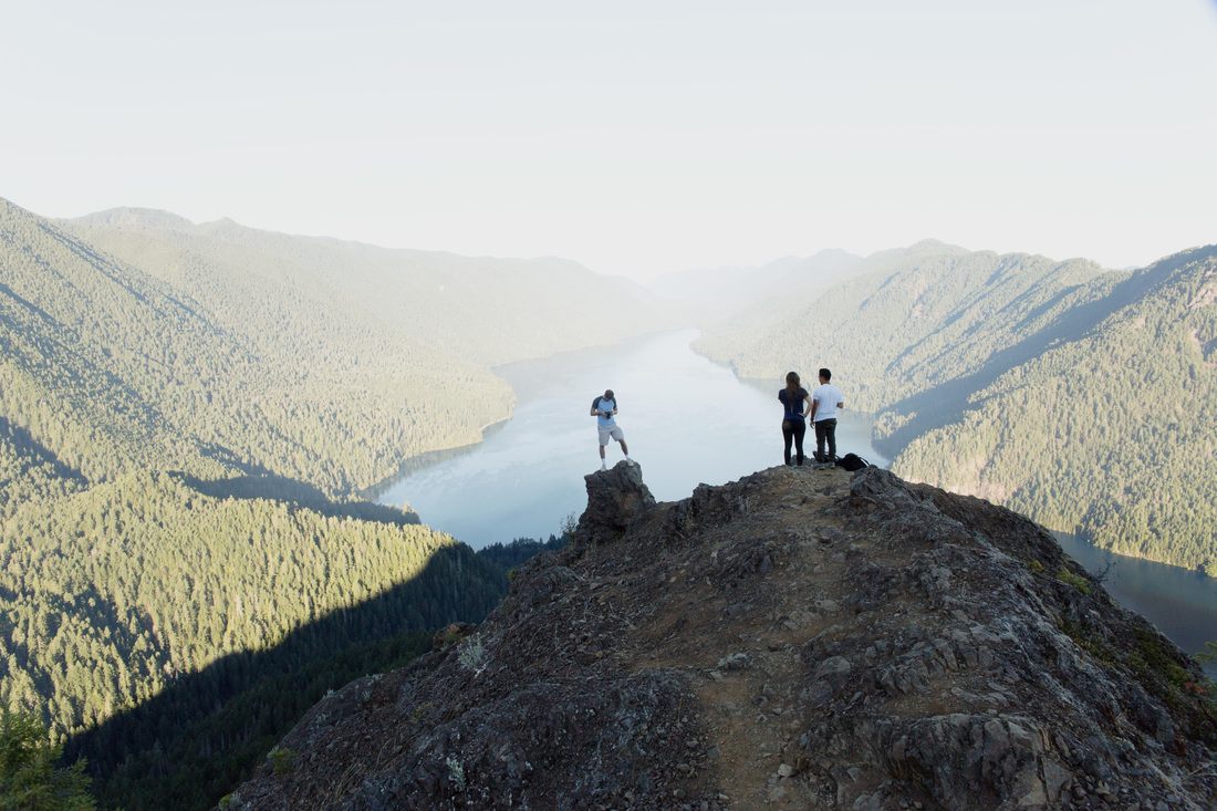 Workshop attendees learning photography techniques in the Olympic Mountains