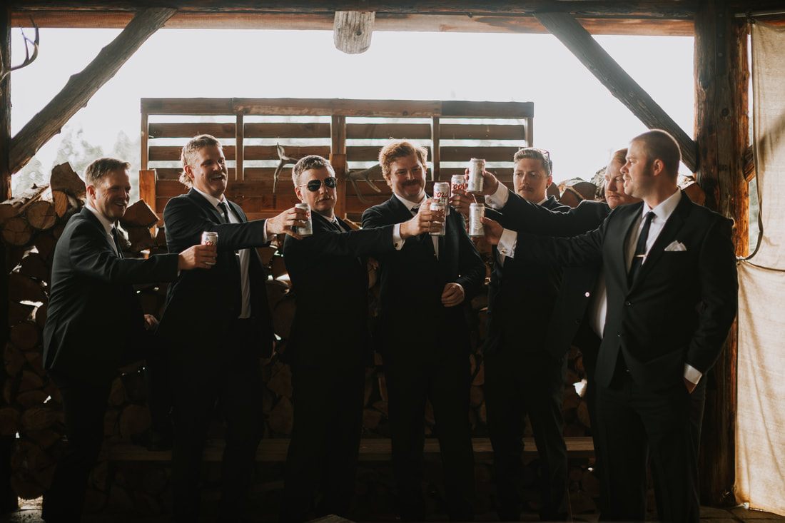Candid moment of laughter between the bride and groom during their Chehalis wedding.