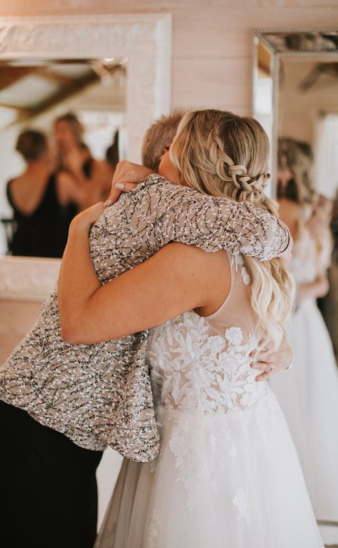 First kiss as newlyweds at their cherry orchard wedding ceremony in Chehalis, WA.