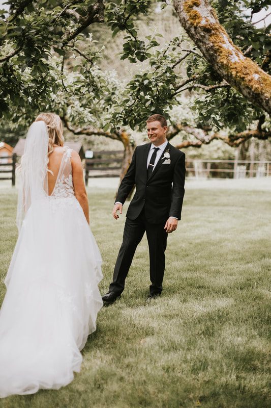Wide shot of The Orchard at Sunshine Hill's 40-acre cherry orchard wedding venue.