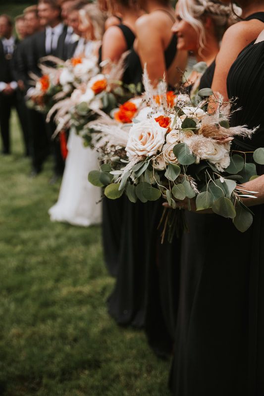 Candid moment of laughter between the bride and groom during their Chehalis wedding.