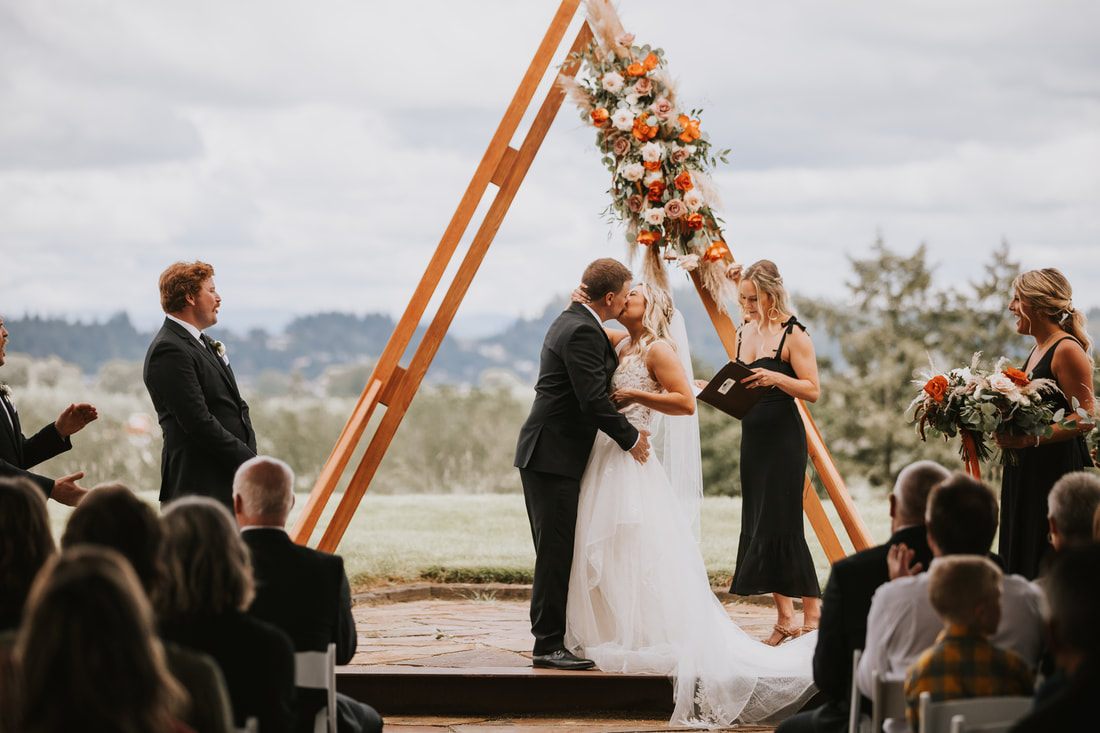 Wide shot of The Orchard at Sunshine Hill's 40-acre cherry orchard wedding venue.
