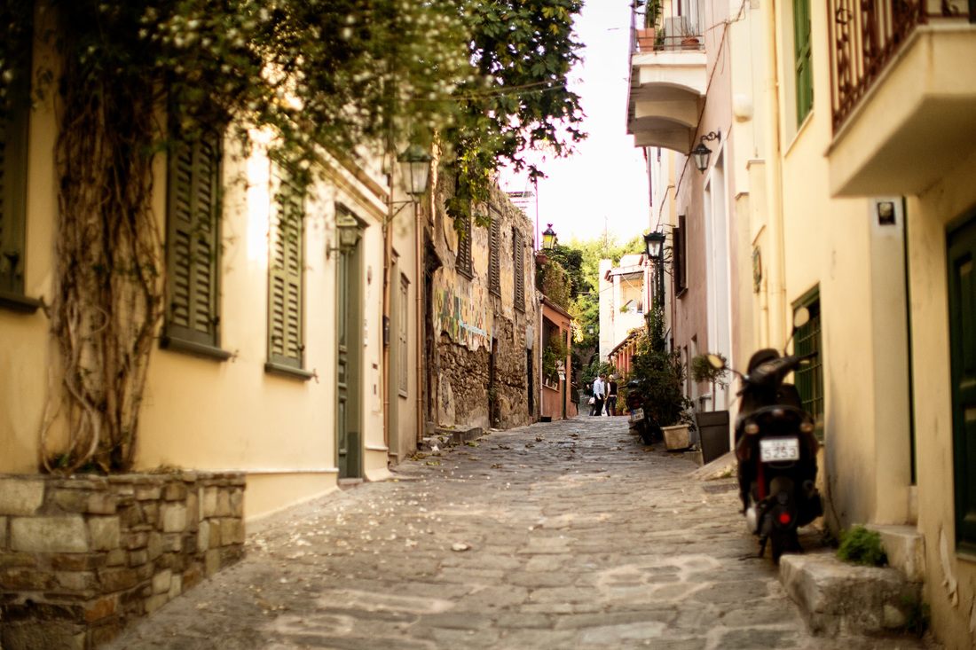 Colorful shopfronts and cafes in the Plaka district of Athens, a different view