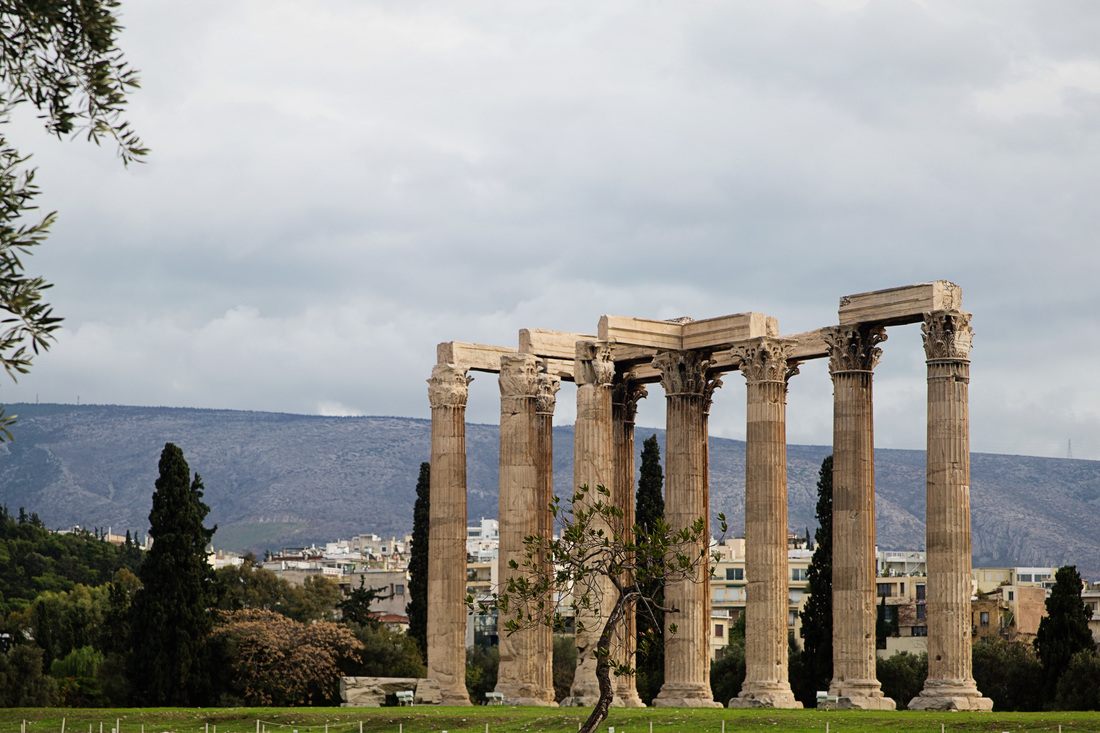 The National Gardens of Athens with lush greenery and shaded paths, a different view