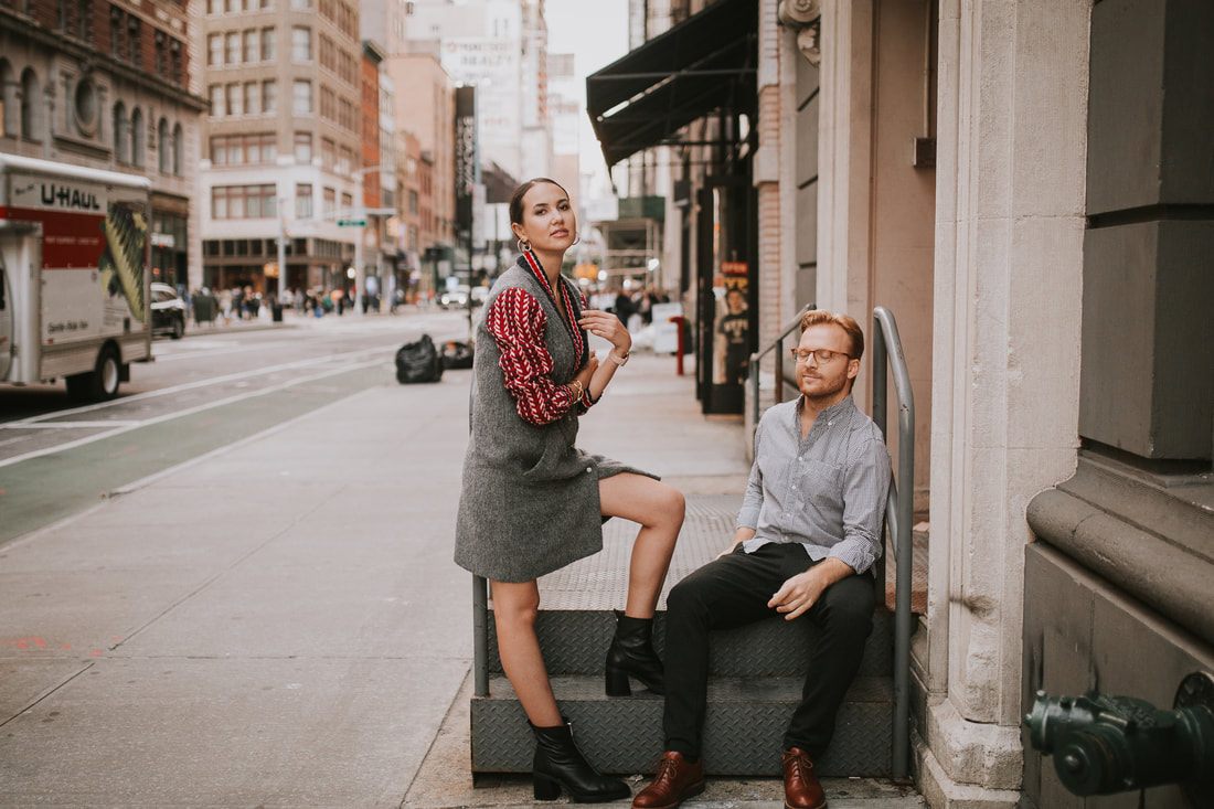 Karina and Matt sharing a quiet moment amid the city's energy