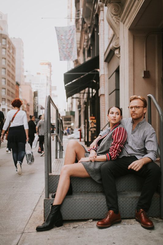 Couple walking through a quiet side street in Manhattan