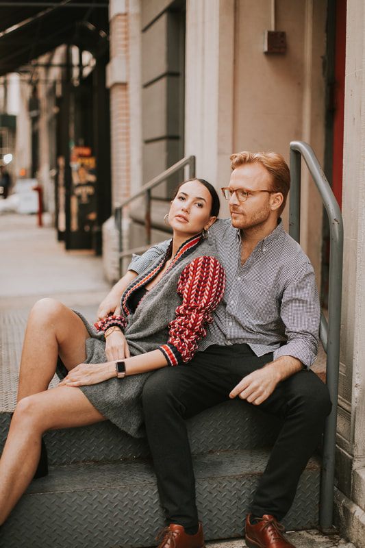 Engagement session portrait with dramatic New York City light and shadow