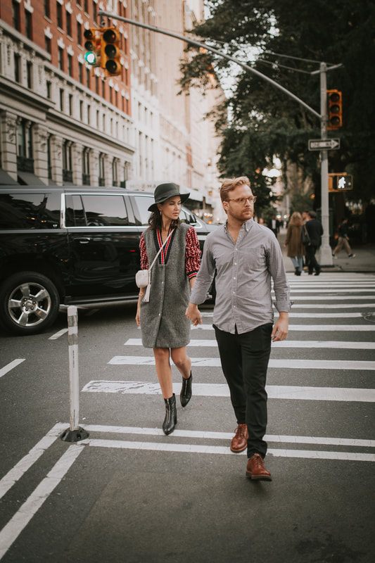 Karina and Matt sharing a kiss on a quiet Manhattan side street