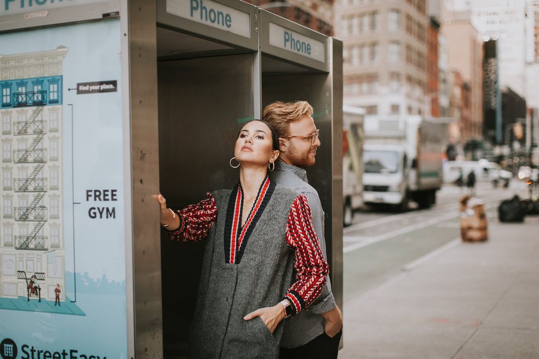 Candid laughter between Karina and Matt on a Manhattan street corner