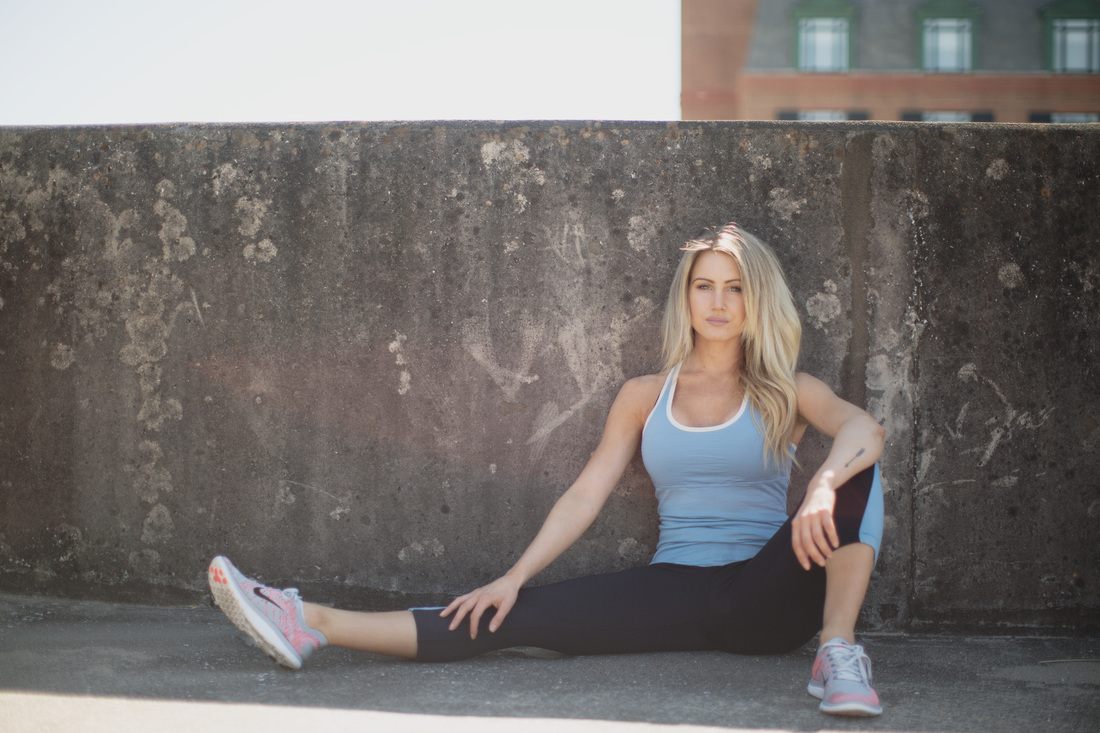 Full-length fitness portrait on a Charleston rooftop