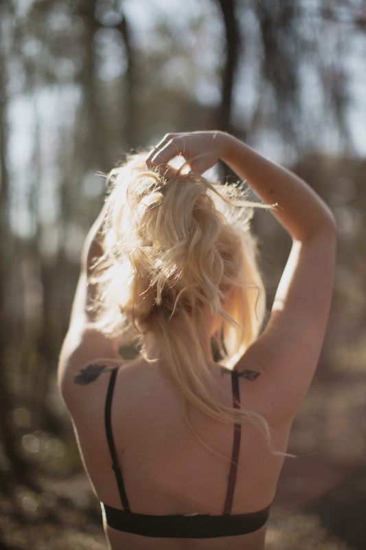 Styled boudoir portrait shot outdoors