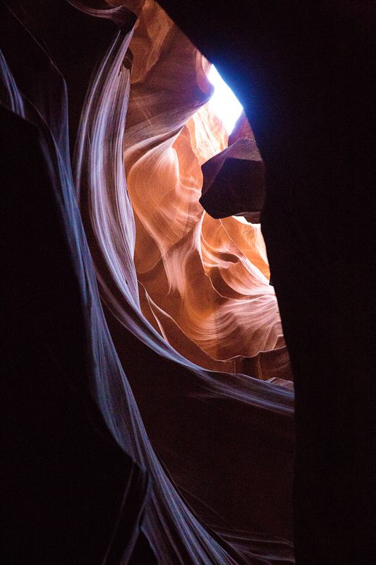 Light beams filtering through the sandstone walls of Antelope Canyon, Arizona