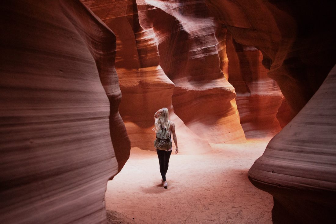Golden light hitting the curved sandstone walls of Antelope Canyon