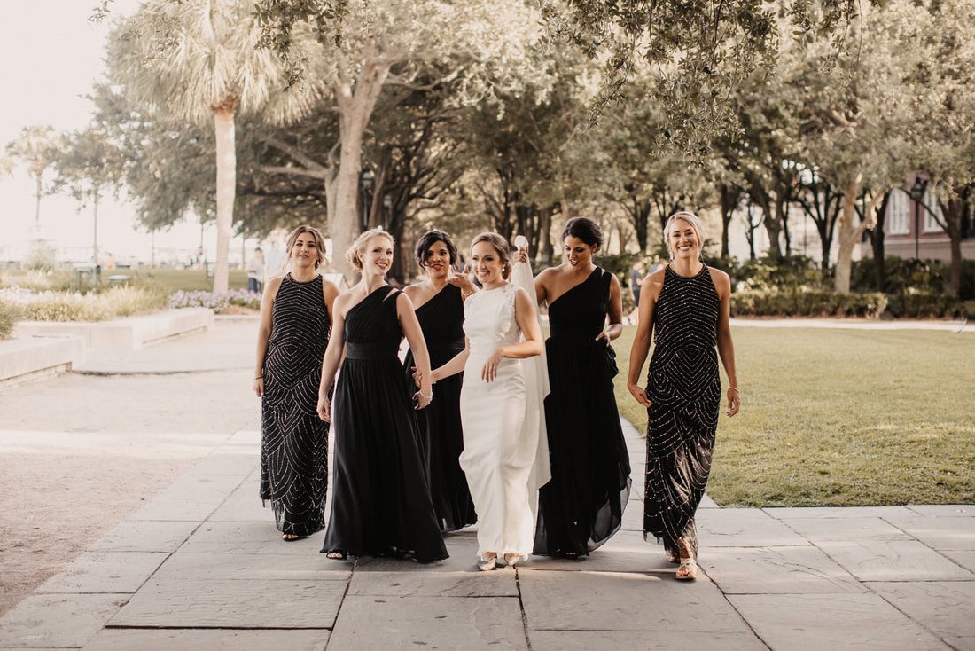 Another shot of the bride getting ready with her bridesmaids at a nearby hotel