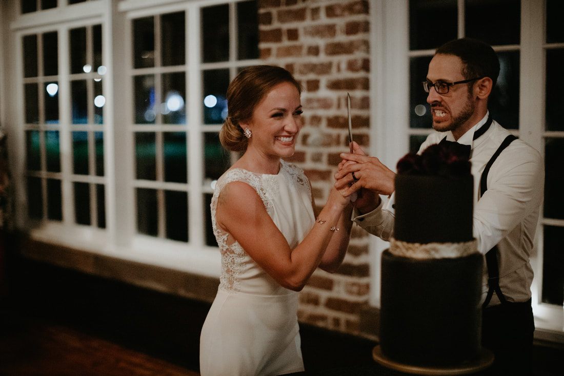 The reception tablescape featuring vintage and black floral details
