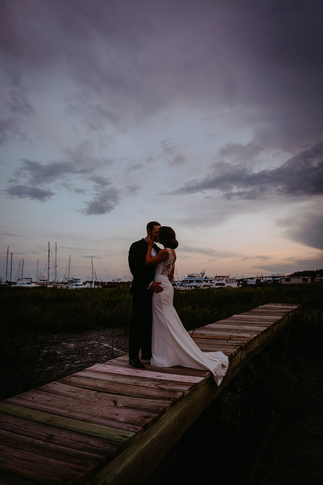 The couple during their ceremony vows at the Historic Rice Mill