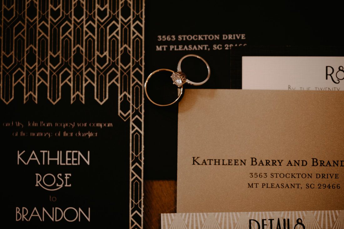 Close-up of the black floral wedding bouquet with vintage details