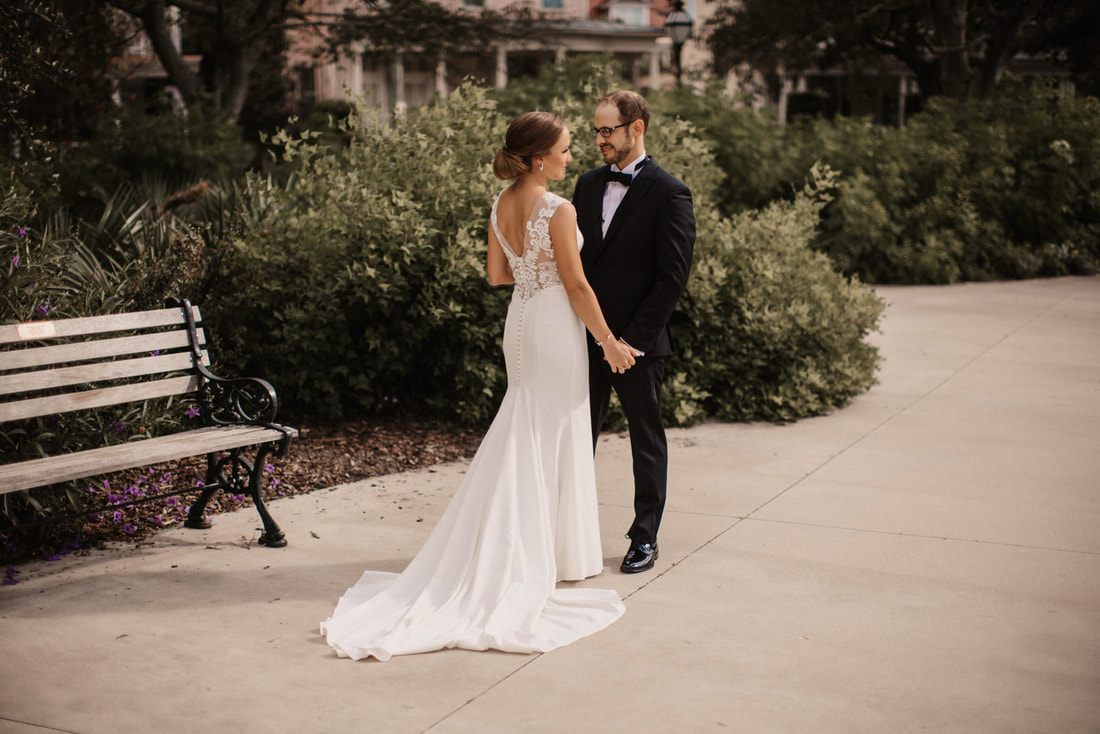 Another moment from the bride and groom's first look at Colonial Lake