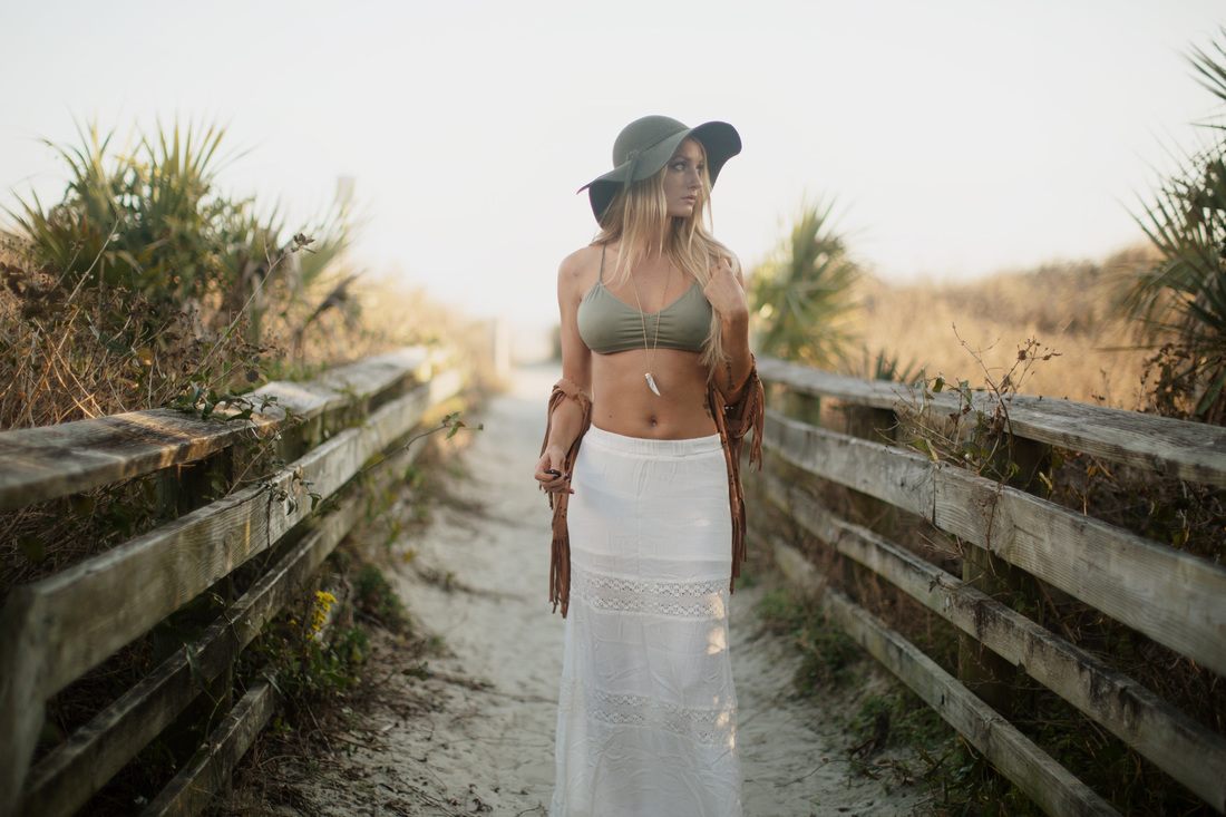 Self-portrait with warm natural light and shallow depth of field
