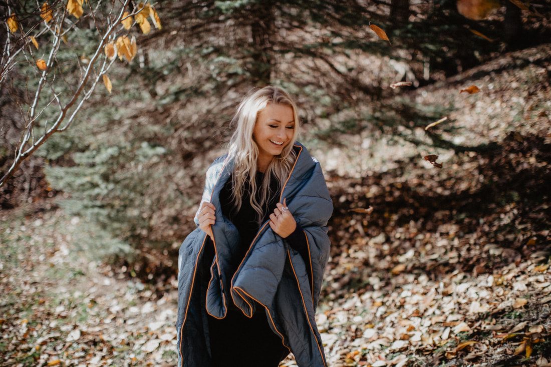 Rumpl blanket laid out on location as part of an outdoor lifestyle photo shoot.