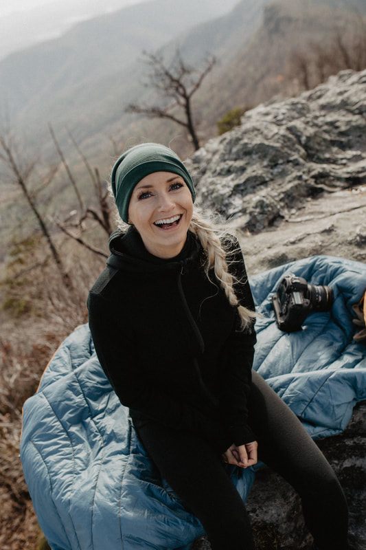 Final commercial lifestyle shot of Rumpl blankets styled for an adventure brand.