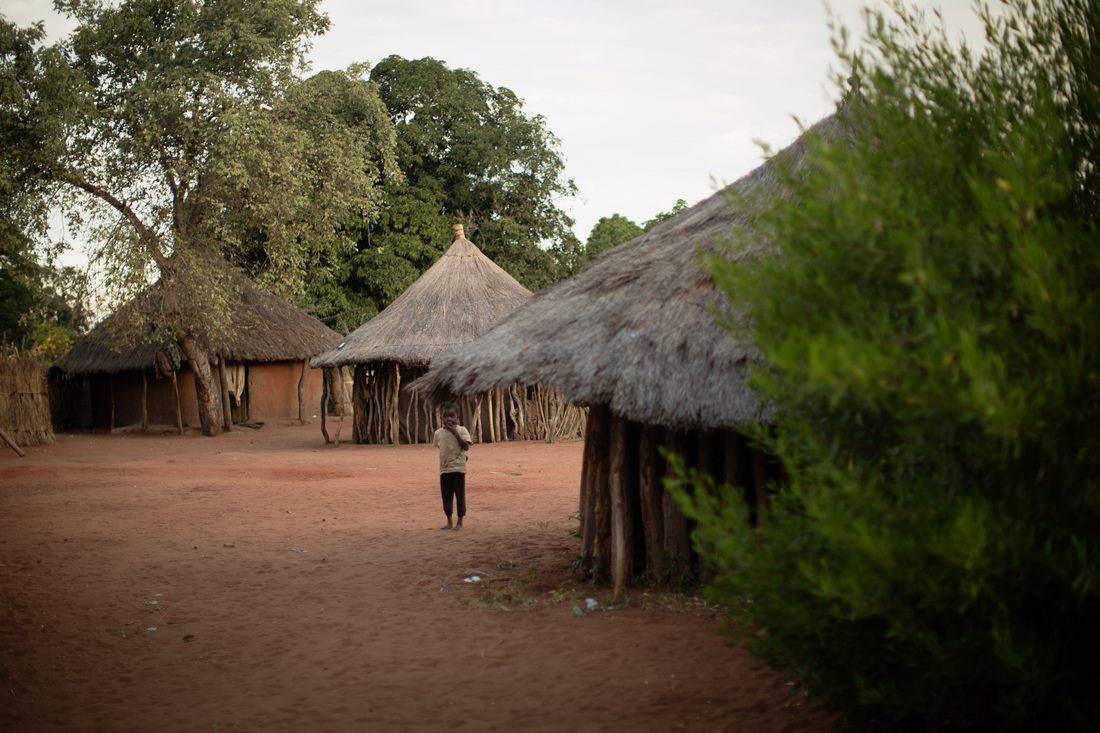 Local artisans displaying handmade crafts in Chief Mukuni Village