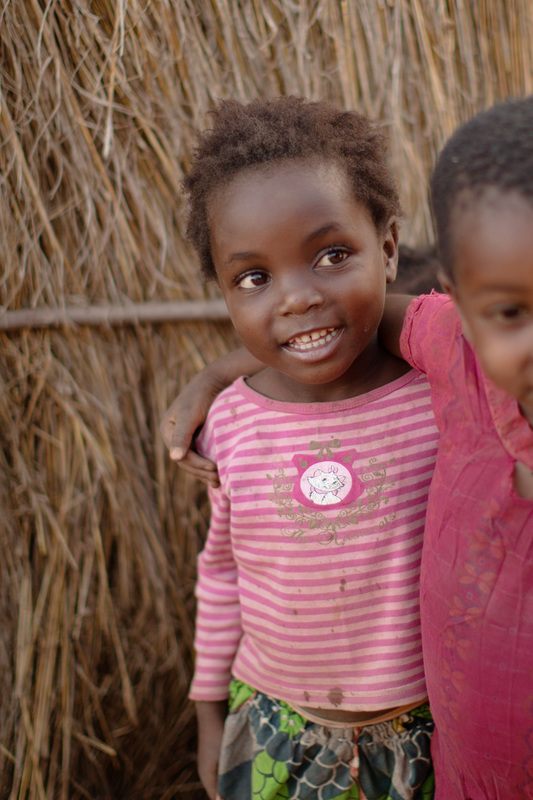 Village kids laughing and playing in Chief Mukuni Village
