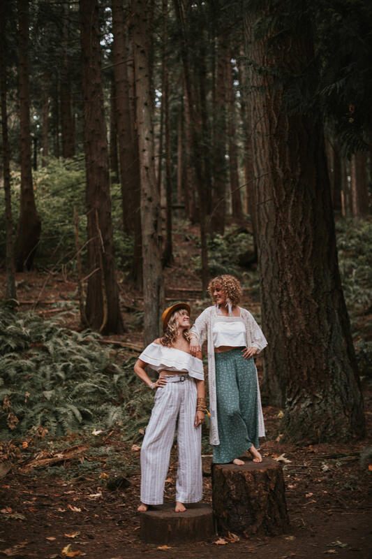 Portrait of the Embracing Your Wild founders in flowing evening gowns