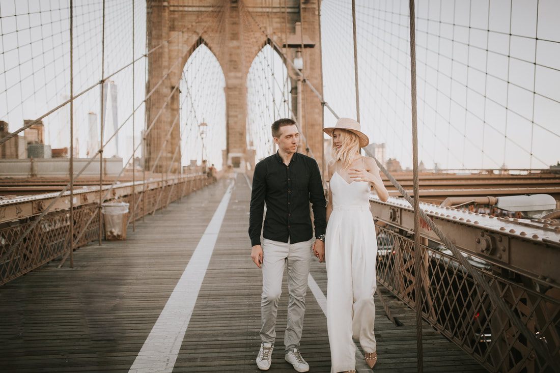 Close-up portrait of Valentina and Alex laughing together in Brooklyn