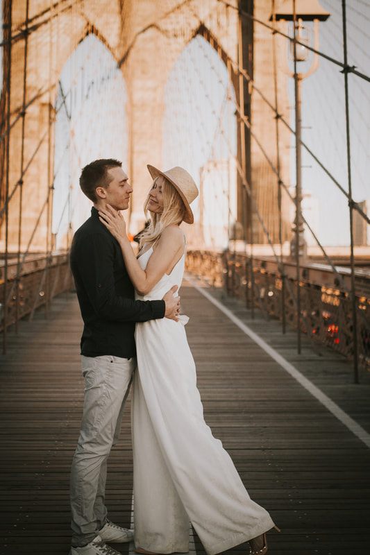 Valentina and Alex posed against the New York City skyline