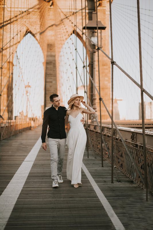 Valentina and Alex posed against the New York City skyline