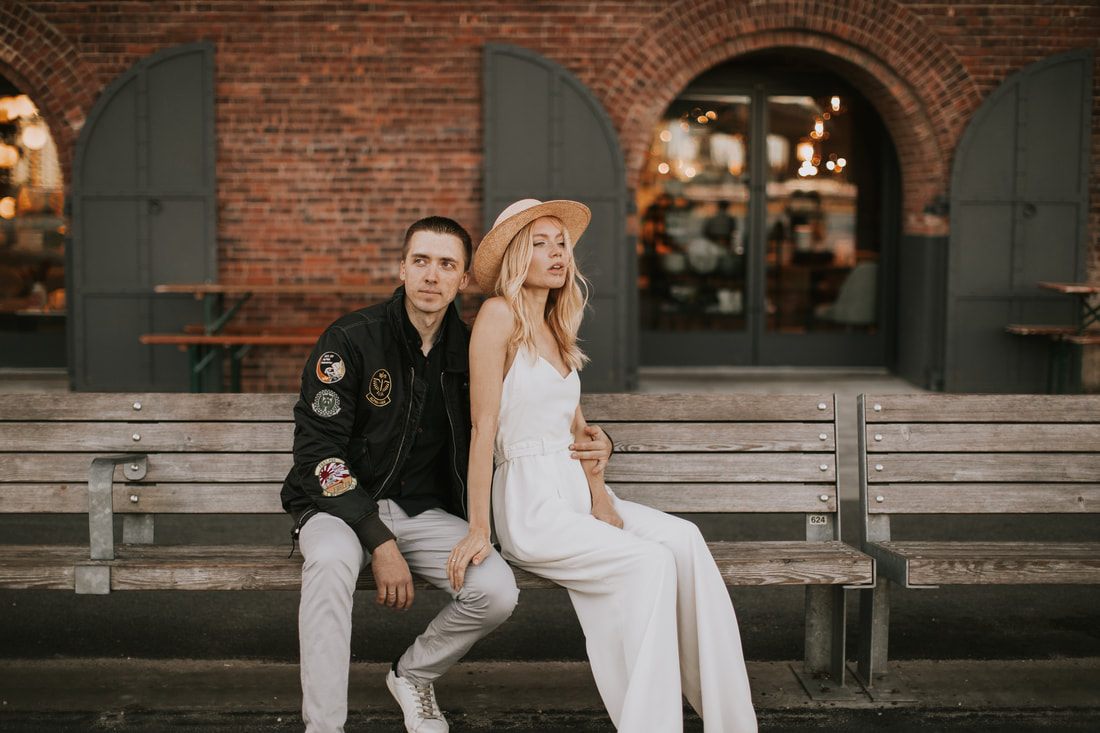 Valentina and Alex watching the sunrise together on the Brooklyn Bridge