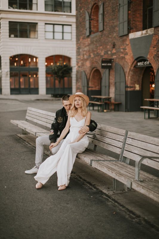Close-up portrait of Valentina and Alex laughing together in Brooklyn