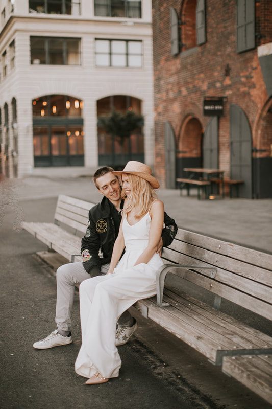 Candid embrace between the couple on a quiet Brooklyn street