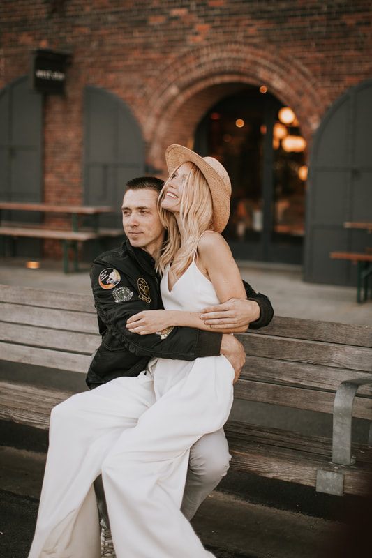 Golden hour portrait of the couple on the Brooklyn Bridge
